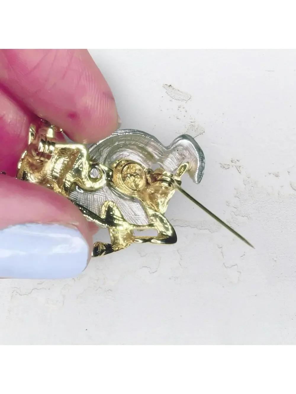 7265. Napier Aires Ram Brooch